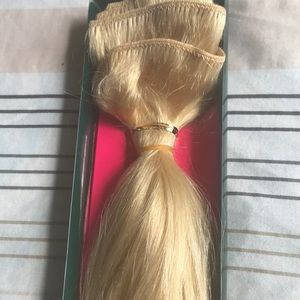 Blonde hair extensions